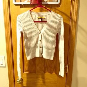 Cream ribbed, button down, cropped cardigan.